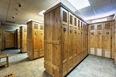 a row of wooden lockers in a room at River Run Village 2 Bedroom Condo - 100 Yards To Slopes, Pool, Hot Tub Access in Keystone