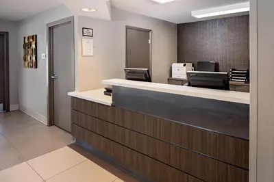 a lobby with a reception desk and a waiting room at Residence Inn Denver Tech Center in Greenwood Village