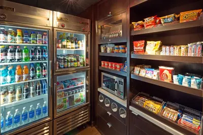 a refrigerator filled with lots of drinks and food at Courtyard by Marriott Denver Golden/Red Rocks in Golden
