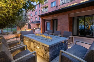 a patio with chairs and a fire pit at Courtyard by Marriott Denver Golden/Red Rocks in Golden
