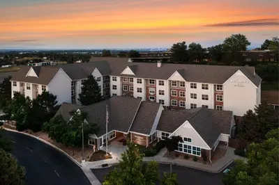 an aerial view of a hotel at dusk at Residence Inn by Marriott Denver Golden/Red Rocks in Golden