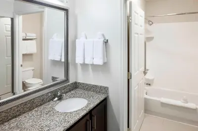 a bathroom with a sink and a mirror at Residence Inn Denver Highlands Ranch in Highlands Ranch