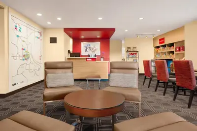 a waiting area in a hospital with chairs and a table at TownePlace Suites by Marriott Boulder Broomfield/Interlocken in Broomfield