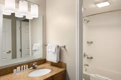 a bathroom with a sink and a mirror at TownePlace Suites by Marriott Denver West Federal Center in Lakewood