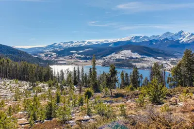 a view of crater lake from the top of a mountain at River Bank Lodge 2924 in Keystone