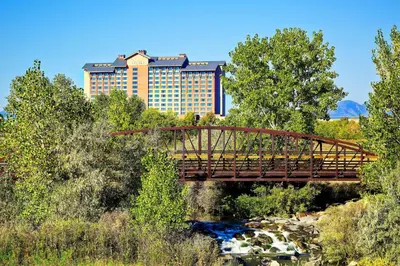 a bridge over a river with a building in the background at The Westin Westminster in Westminster