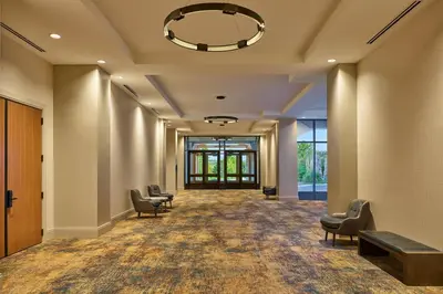 an empty hallway with chairs and a waiting room at The Westin Westminster in Westminster