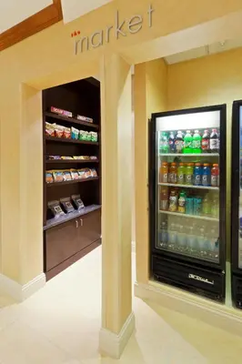 a large refrigerator in a store with drinks at Residence Inn Boulder Longmont in Longmont
