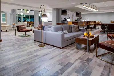 a living room with a couch and a table at Residence Inn by Marriott Boulder Broomfield/Interlocken in Broomfield