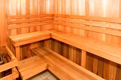 an inside view of a wooden sauna at Holiday Inn Express & Suites - Aurora Medical Campus by IHG in Aurora