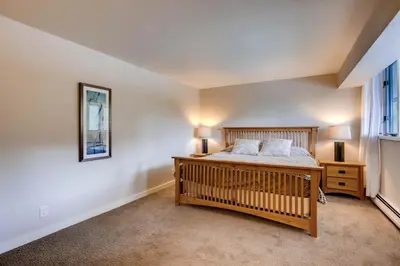 a bedroom with a crib and a window at Sts, Johns 2507 in Keystone