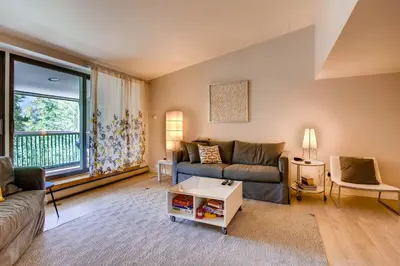 a living room with a couch and a table at Sts, Johns 2507 in Keystone