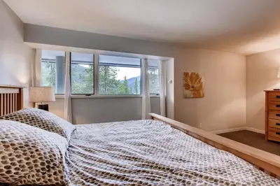 a bedroom with a bed and a window at Sts, Johns 2507 in Keystone