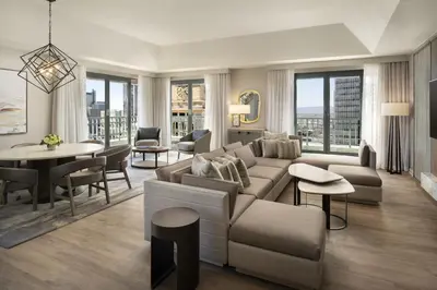 a living room with a couch and a table at The Westin Denver Downtown in Denver