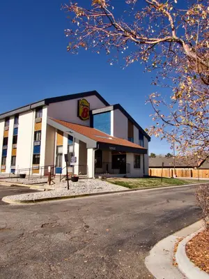 a building on the side of a road at Super 8 by Wyndham Westminster Denver North in Westminster