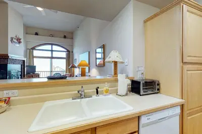 a kitchen with a sink and a microwave at Dillon Commons Studio in Dillon