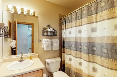 a bathroom with a sink and a toilet and a shower at Dillon Commons Studio in Dillon