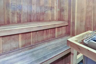 a wood paneled sauna with two wooden shelves at Buffalo Village 402 in Silverthorne