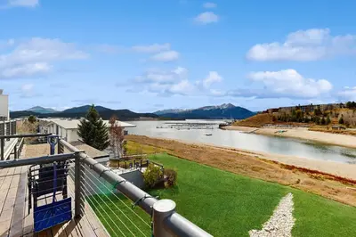 a balcony with a view of a river at East Bay 6 in Dillon