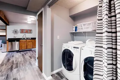 a laundry room with a washer and dryer at Blue River Rendezvous in Silverthorne