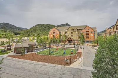 a park with a playground in the middle of a city at 8619 Expedition Station Condo in Keystone