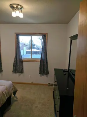 a bedroom with a bed and a window at DIA BnB - Mountain View - Private floor - DIA Layover - Great entertainment and bed in Brighton