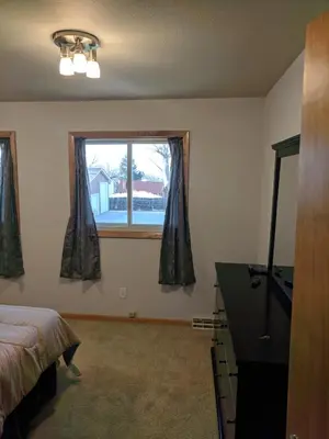 a bedroom with a bed and a window at DIA BnB - Mountain View - Private floor - DIA Layover - Great entertainment and bed in Brighton