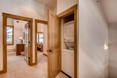 a bathroom with a toilet in a room at Ski Tip Townhomes 8713 in Keystone