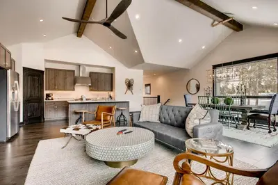 a living room with a couch and a table at River Run Townhome RR42 in Keystone