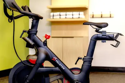 a black bike is parked in a room at Spark by Hilton Denver International Airport in Denver
