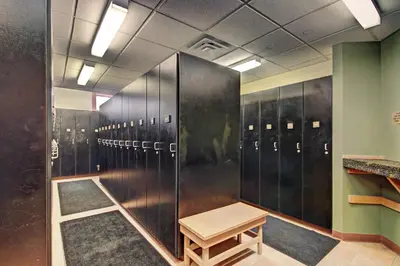 a row of lockers with a bench in a locker room at 8577 Expedition Station Condo in Keystone
