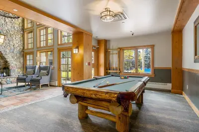 a large room with a pool table in it at 8577 Expedition Station Condo in Keystone