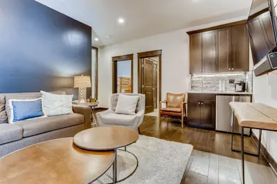 a living room with a couch and a table at River Run Townhome RR51 in Keystone