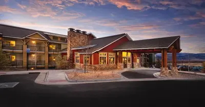 a building with a parking lot in front of it at WorldMark Granby - Rocky Mountain Preserve in Granby