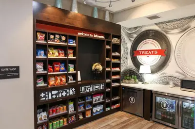 a grocery store with a shelf filled with food at Hampton Inn & Suites Lafayette in Lafayette