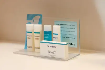 a display of moisturizers and a box on a shelf at Hampton Inn & Suites Lafayette in Lafayette