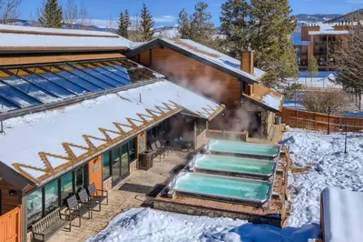 an overhead view of a house with a pool in the snow at Mountainside 523 Home in Frisco