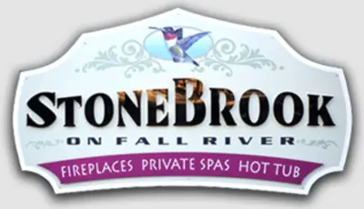 a sign for a store brook on fall river at Stonebrook Resort - Adult Only in Estes Park