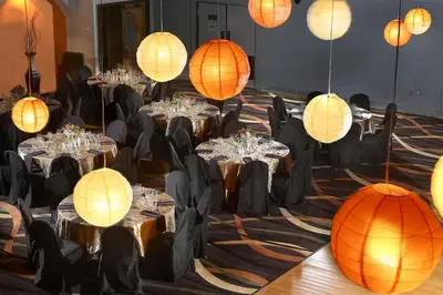 a group of tables with lanterns in a room at DoubleTree by Hilton Hotel Denver - Thornton in Thornton