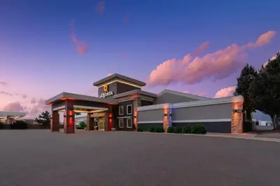 a rendering of a house with a driveway at La Quinta Inn & Suites by Wyndham Fort Collins, Colorado in Fort Collins