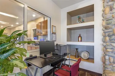 a home office with a desk and a computer at Best Western Firestone Inn & Suites in Longmont