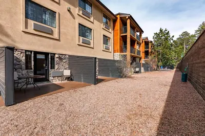 an empty driveway in front of a building at Comfort Suites Golden West on Evergreen Parkway in Evergreen