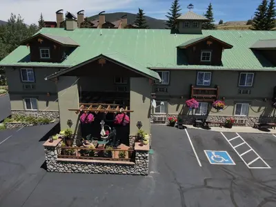 an aerial view of a building with a horse in a window at Dillon Inn in Dillon