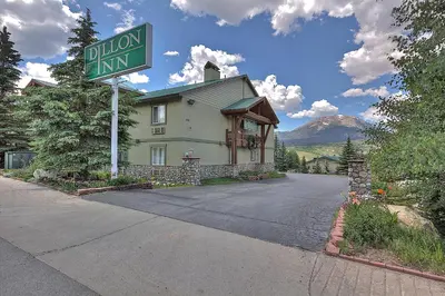 a street sign in front of a house at Dillon Inn in Dillon