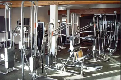 a gym with lots of cardio equipment in it at 61 Jabberwocky Home by Stay Winter Park in Fraser