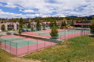 an aerial view of two tennis courts in a town at 61 Jabberwocky Home by Stay Winter Park in Fraser