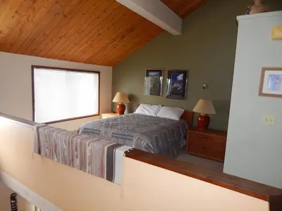 a bedroom with a bed and a window at Timber Ridge Building B, Unit 2 in Winter Park