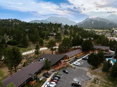an aerial view of a hotel with a parking lot at Trailhead Lodge in Estes Park
