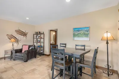 a dining room with a table and chairs at Snowline Vista Lodge in Estes Park