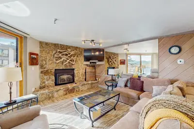 a living room with a couch and a fireplace at La Bonte Leisure Beauty in Dillon